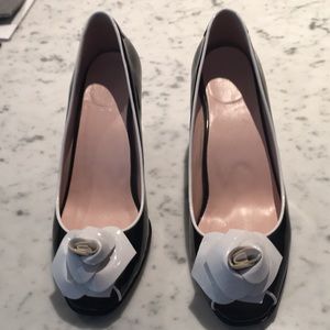 Women’s black & white patent 3 inch heels.